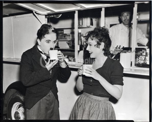 Chaplin and Paulette Goddard having tea on the set of The Great Dictator