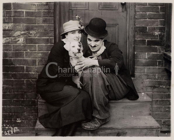 Edna Purviance, Mutt and Charlie Chaplin in a publicity still for A Dog's Life