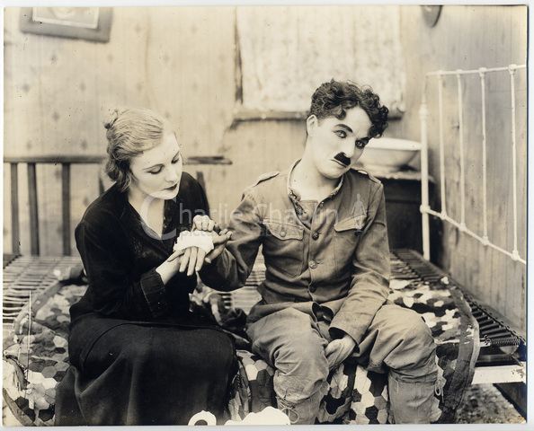 Shoulder Arms publicity still with Edna Purviance and Charlie Chaplin
