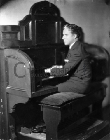 Chaplin playing the organ