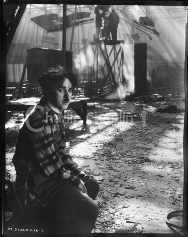 Chaplin on the set of The Circus after a fire raged through the studio during the ninth month of shooting, destroying sets and props.