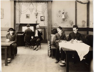 The_immigrant_restaurant_scene_chaplin_and_edna_purviance_medium