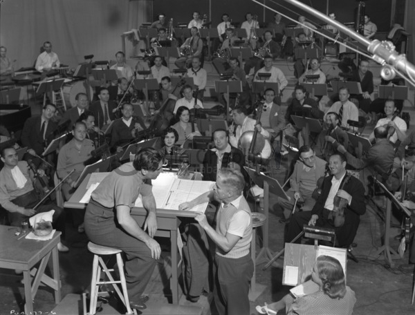 Chaplin and Meredith Wilson rehearsing with musicians for The Great Dictator