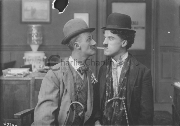 Ben Turpin and Charles Chaplin in costume, 1915
