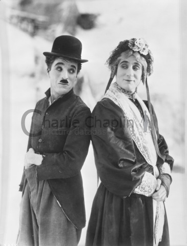 Charlie Chaplin and Sydney Chaplin, dressed as the main character of "Charley's Aunt"