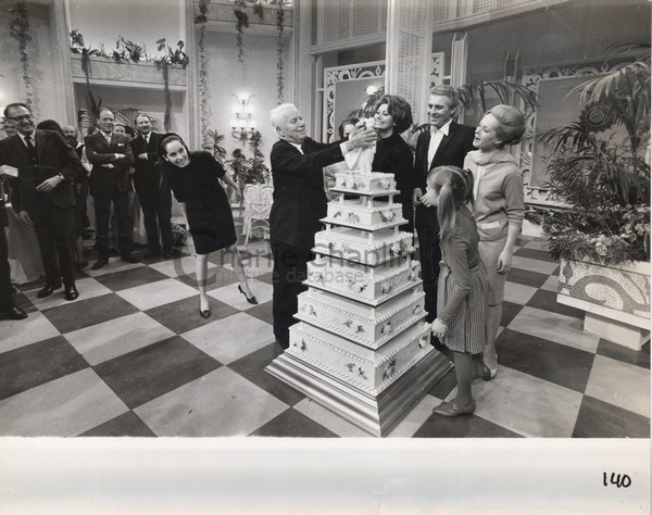 Charlie Chaplin celebrating his 77th birthday on the set of A Countess from Hong Kong