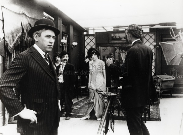 Mack Sennett on a film set