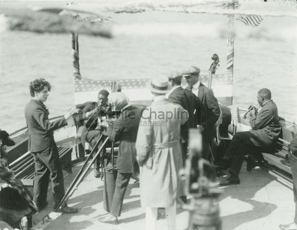 Chaplin (left) directing A Day's Pleasure on a pleasure boat he rented