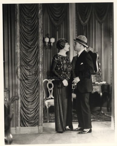 Chaplin directing Edna Purviance in A Woman of Paris