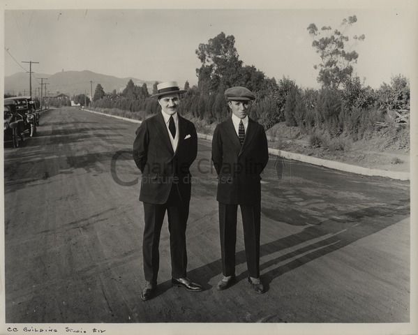 Sydney & Charlie Chaplin during the construction of Chaplin Studios in Los Angeles