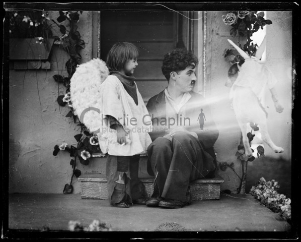 Jackie Coogan and Charlie Chaplin on the set of The Kid