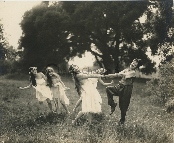 Chaplin dancing with the wood nymphs in Sunnyside