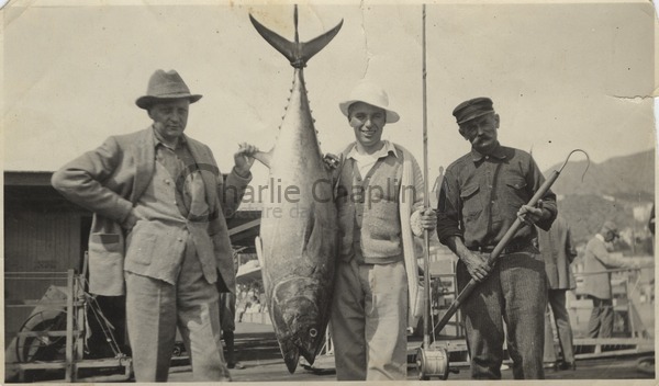 Charles Chaplin, Edward Knoblock, after fishing a tuna fish - Charlie  Chaplin Image Bank